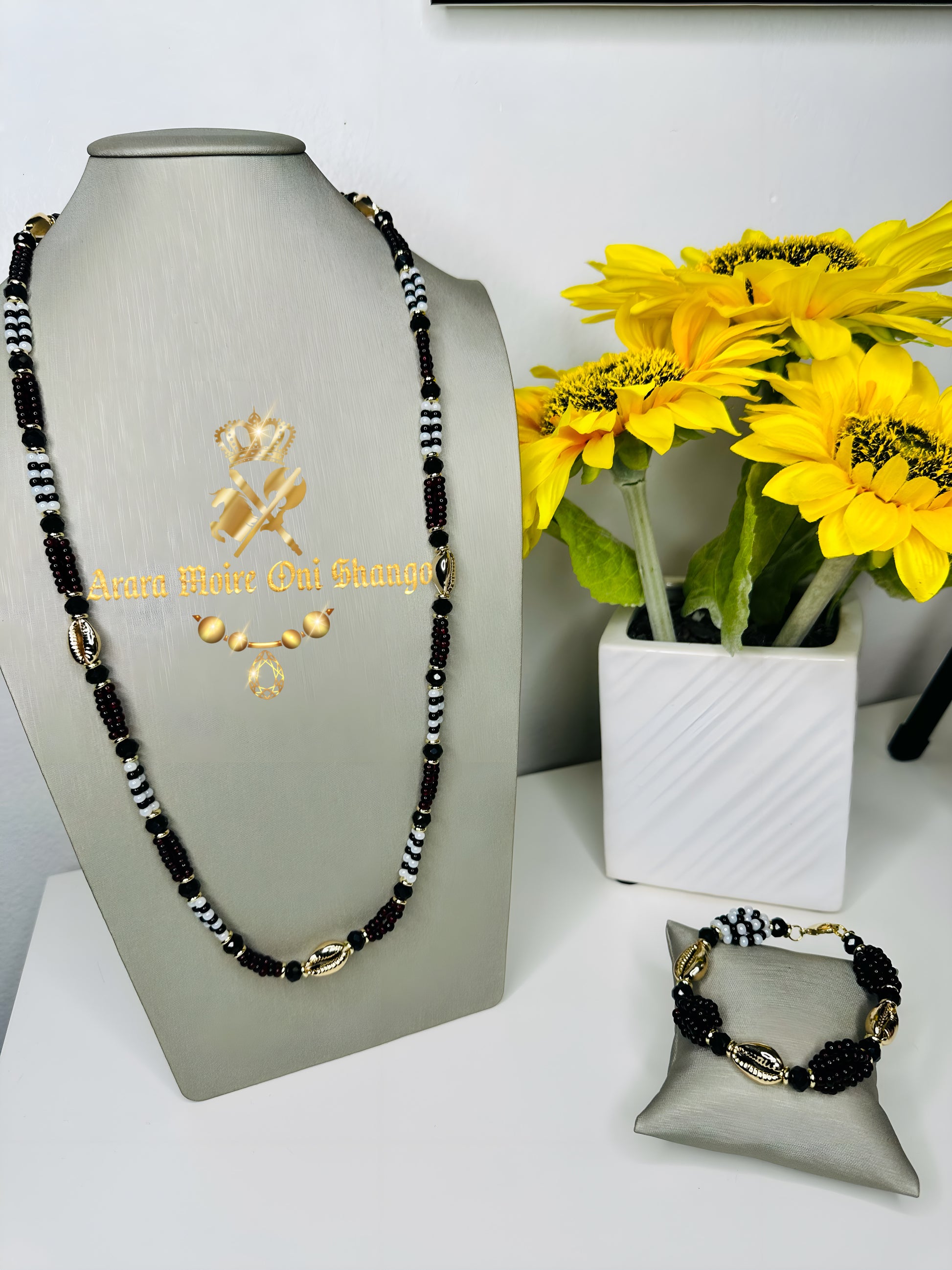 Collar e Idde de Elegguá y Afra