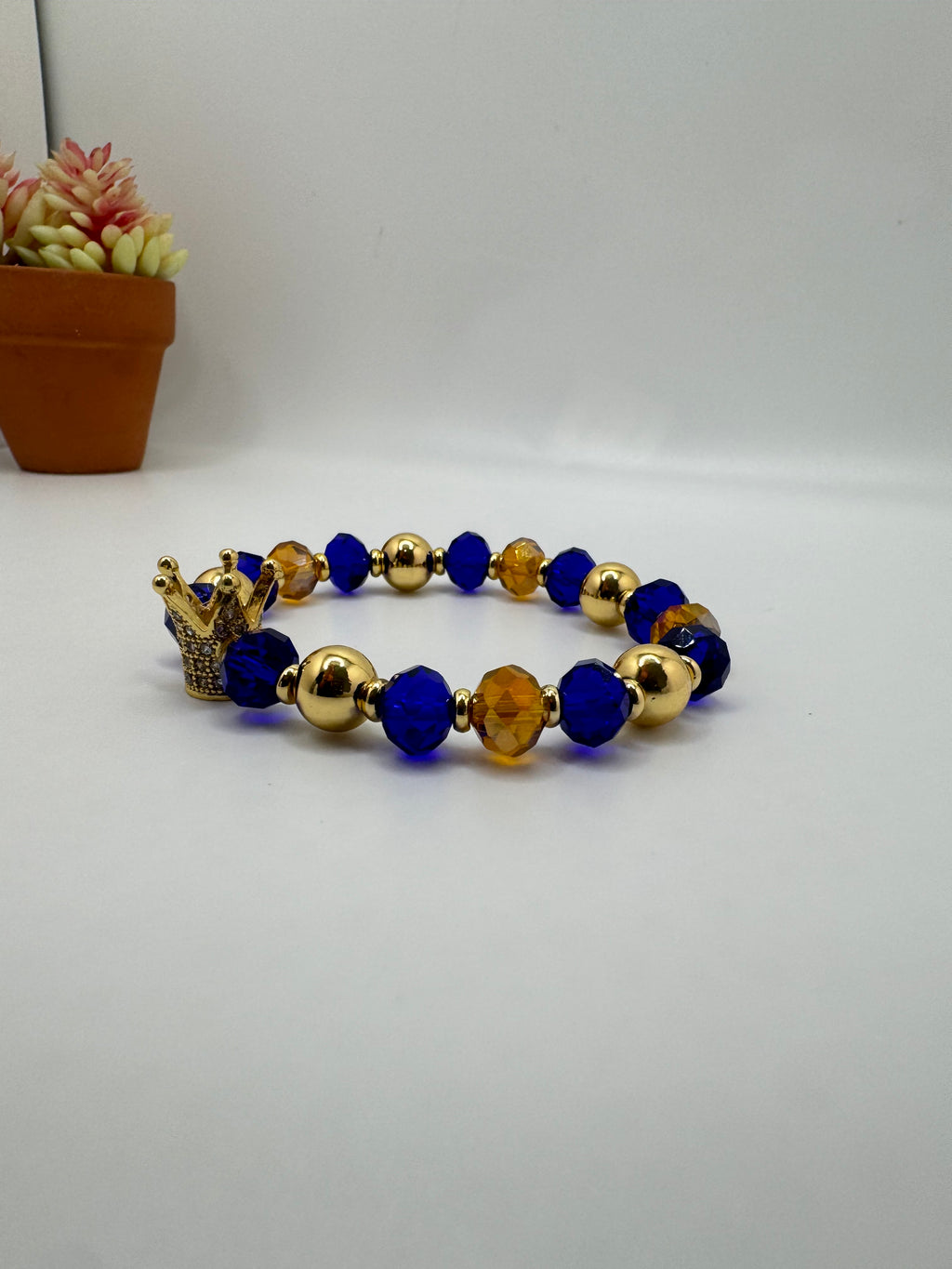 Idde sencillo de Ochosi con corona
